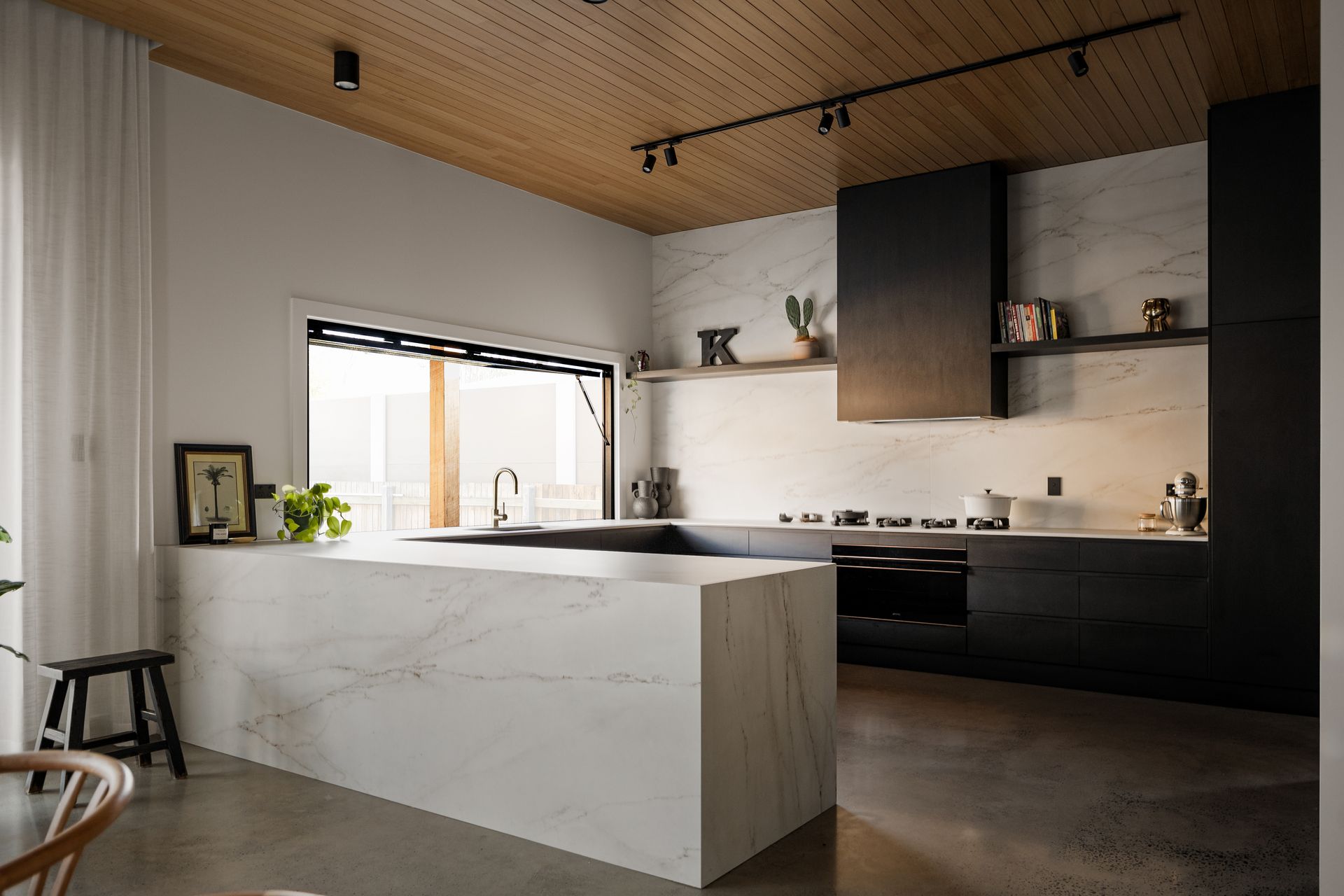 A Kitchen With White Marble Tabletop — Halls Cabinets & Joinery in Harlaxton, QLD