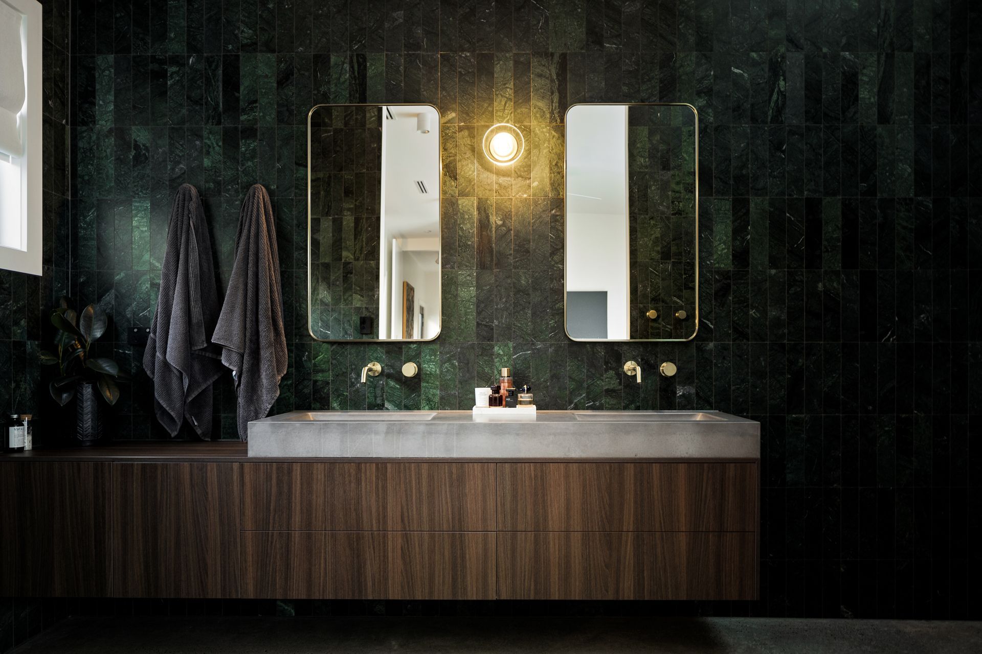 A Bathroom With Green Marble Tiles and a Two Sinks — Halls Cabinets & Joinery in Harlaxton, QLD
