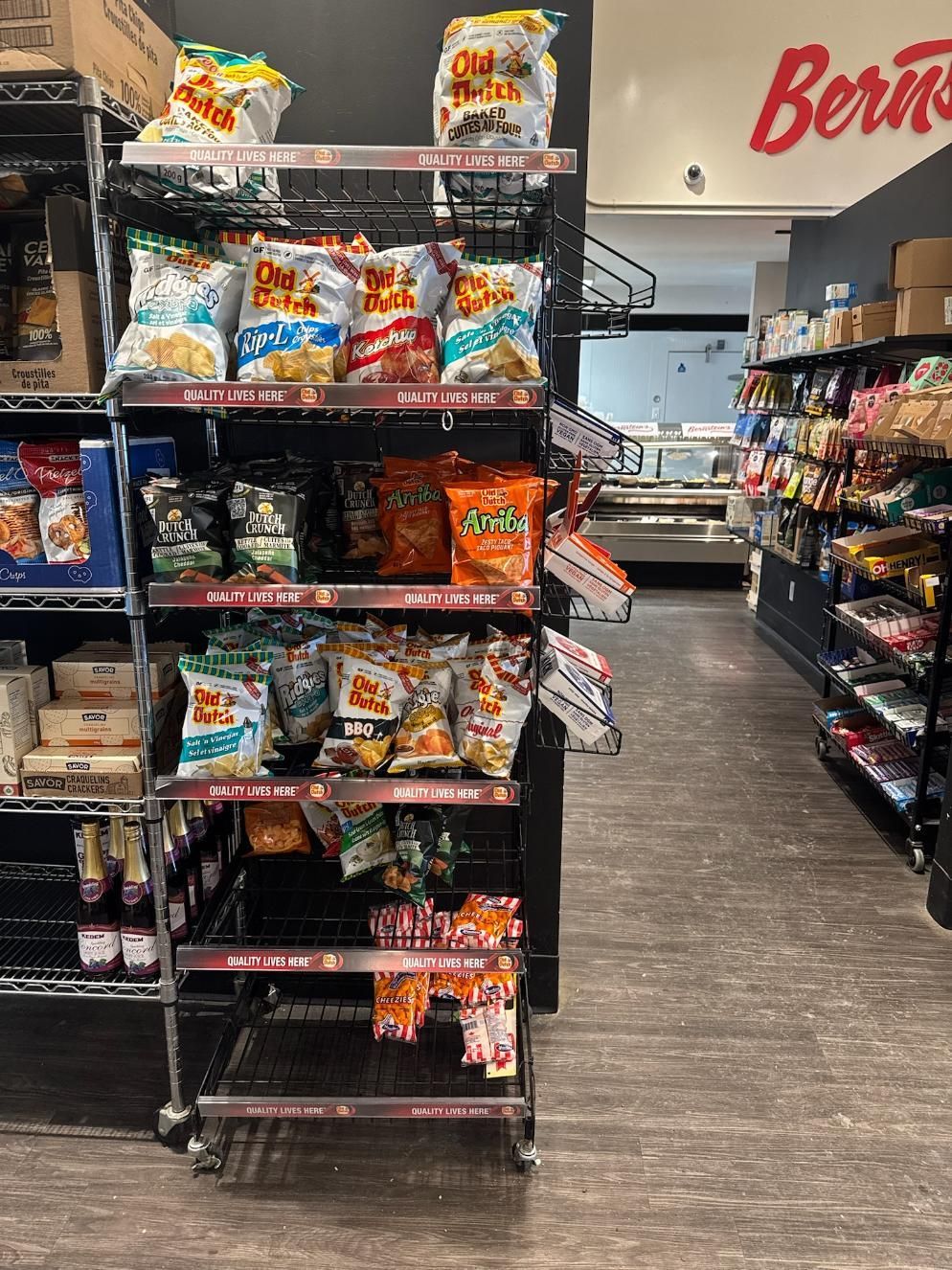 An empty restaurant with tables and chairs set for dinner
