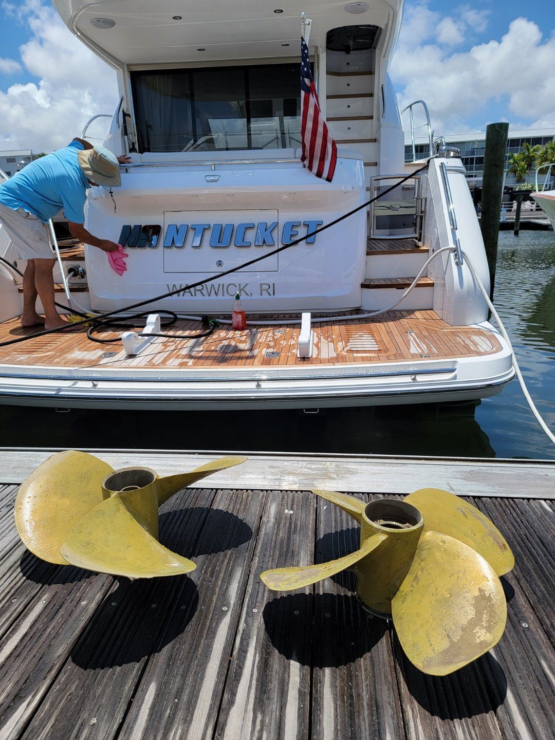 A hull diver shows the Volvo IPS Propellers he both removed and installed underwater on a 50' Princess yacht
