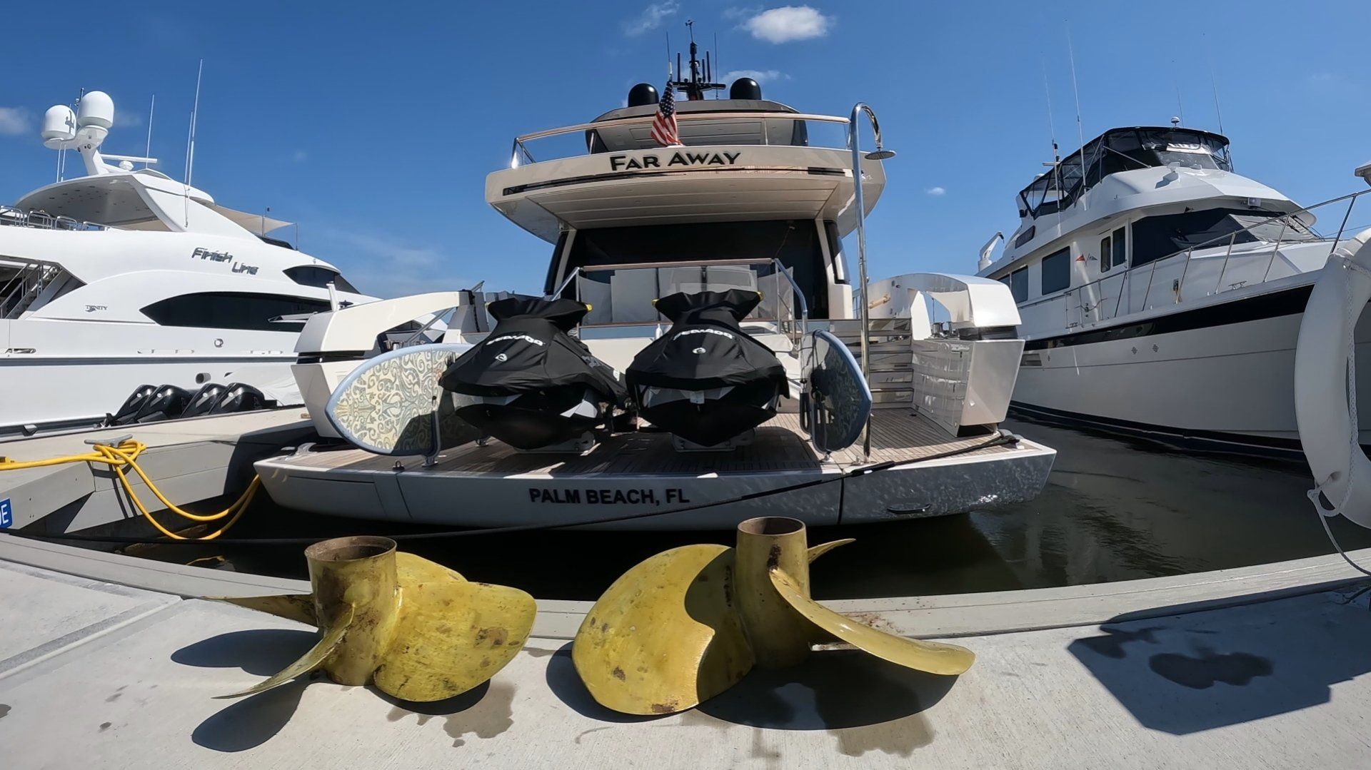 A hull diver shows the Volvo Penta IPS Q Series Propellers he both removed and installed underwater on a 88' Sanlorenzo yacht