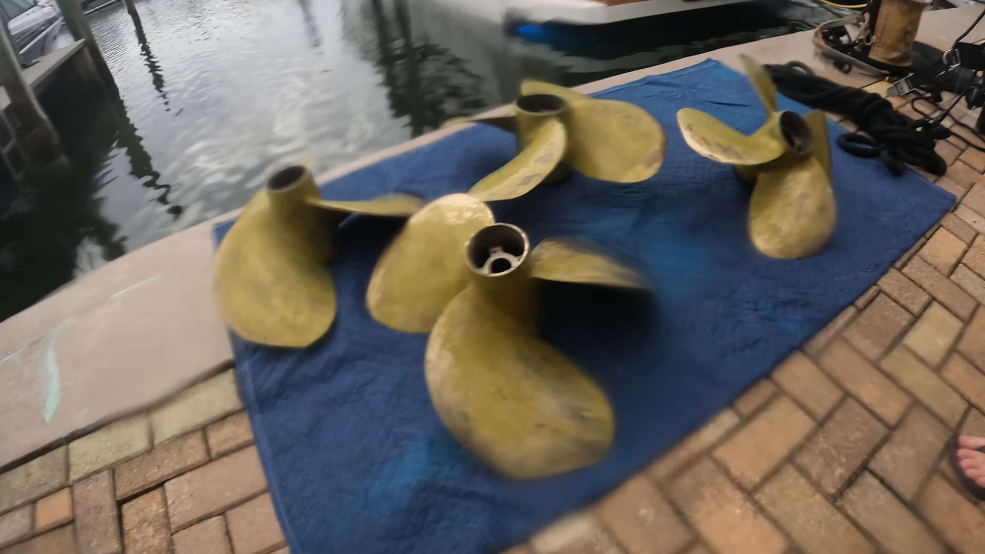 A group of propellers sitting on top of a blue towel.