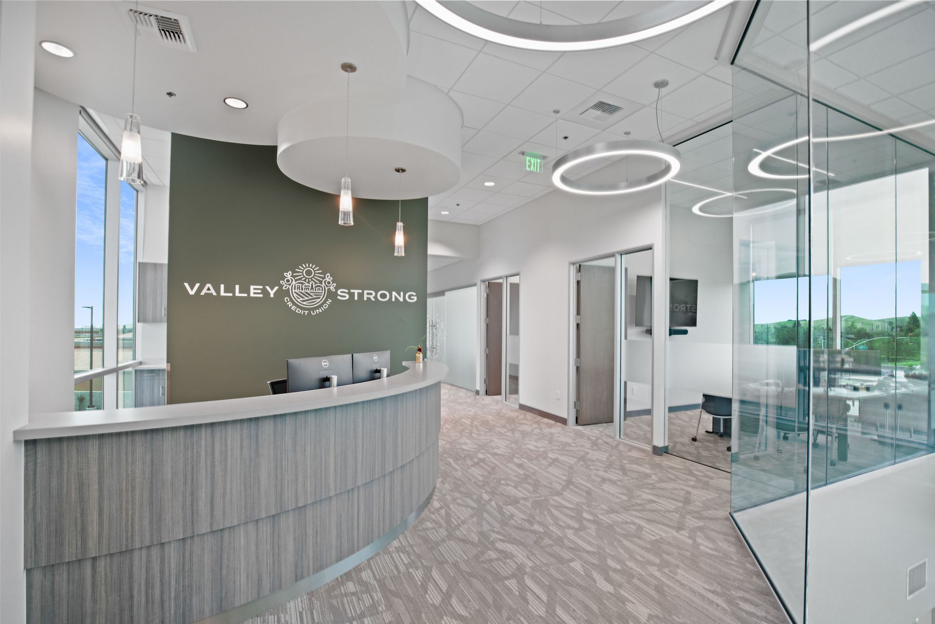 There is a reception desk in the middle of the room.