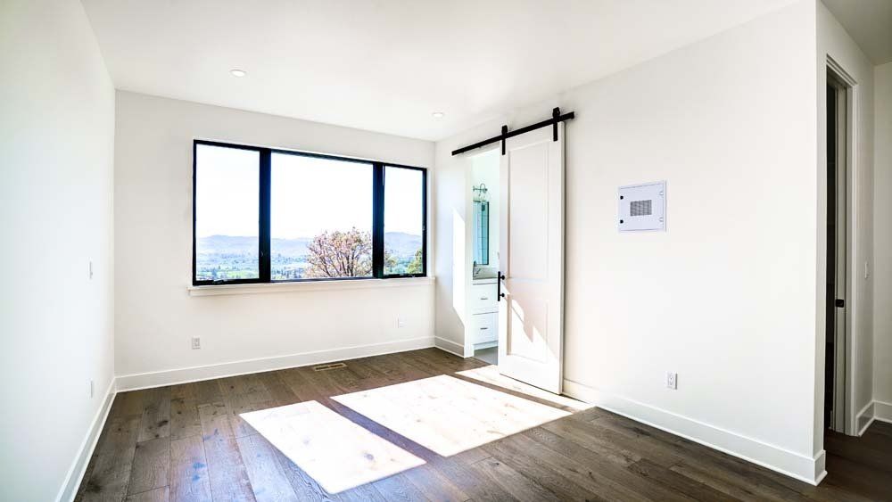 There is a large window in the middle of the room.