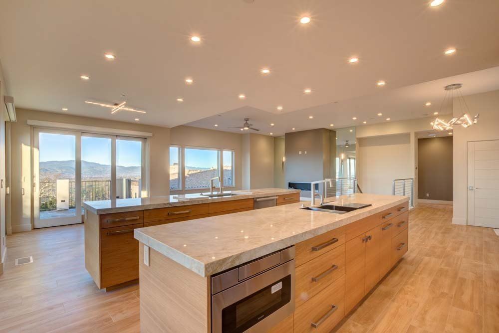 There is a large island in the middle of the kitchen.