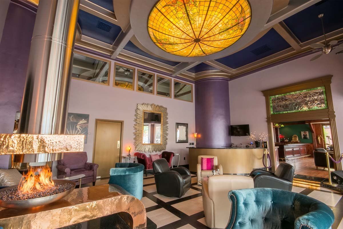 There is a fireplace in the middle of the room.