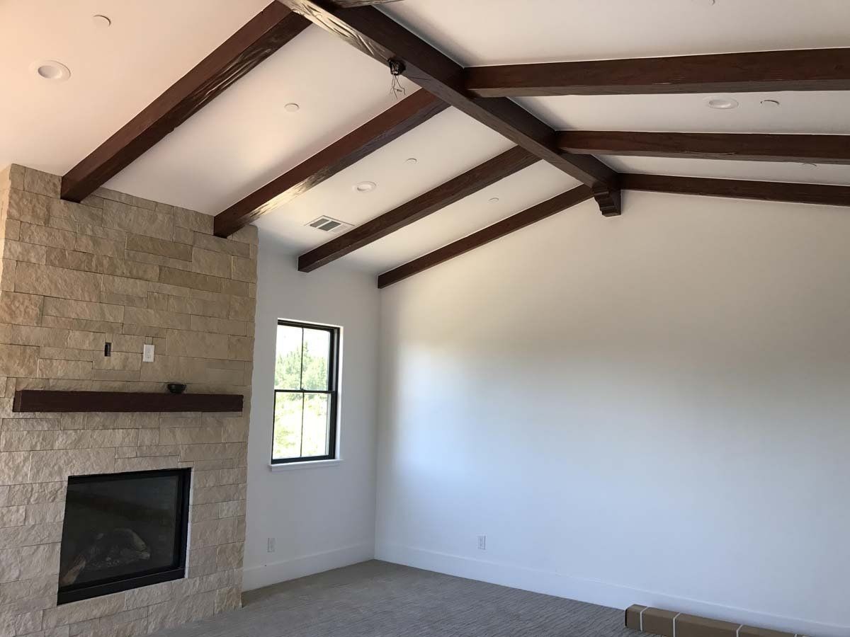 There is a fireplace in the middle of the room.