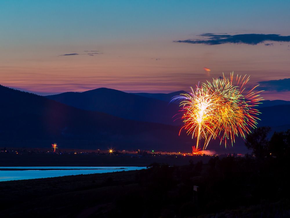 mountain lake with fireworks