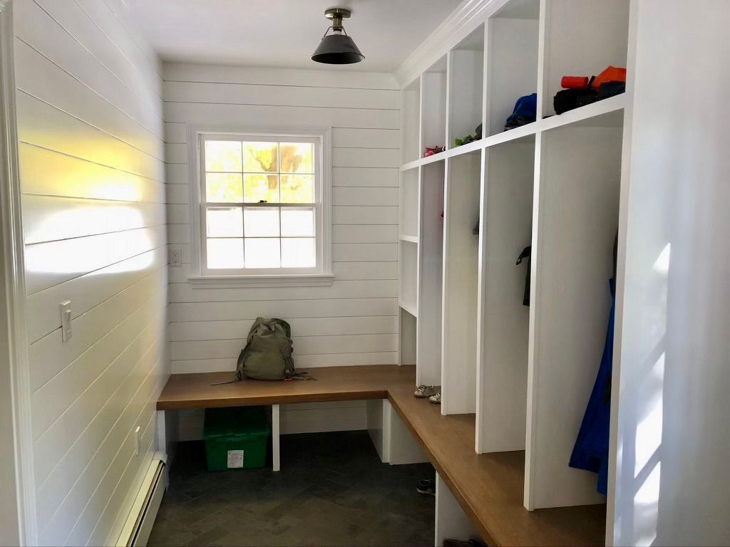 Custom built in cabinets in mud room renovation by licensed general contractor in Shrewsbury Massachusetts 