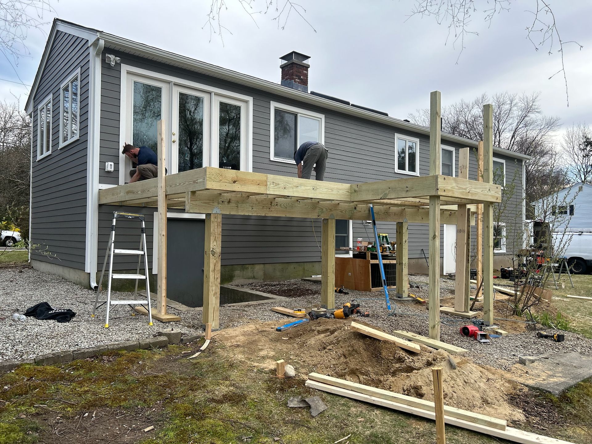 Renovated patio deck in shrewsbury massachusetts by licensed general contractor 