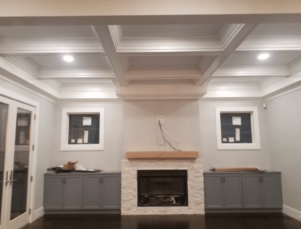 Fireplace installation with custom built-ins by licensed general contractor in Westborough, Massachusetts 