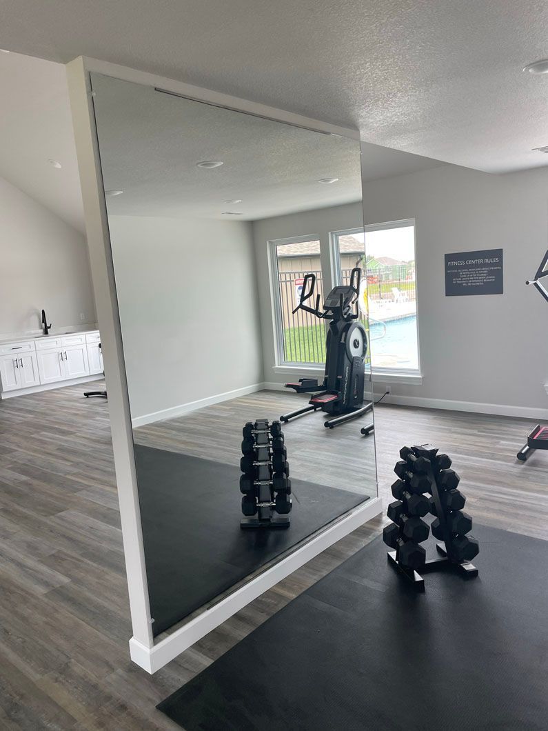 There is a large mirror in the middle of the room.