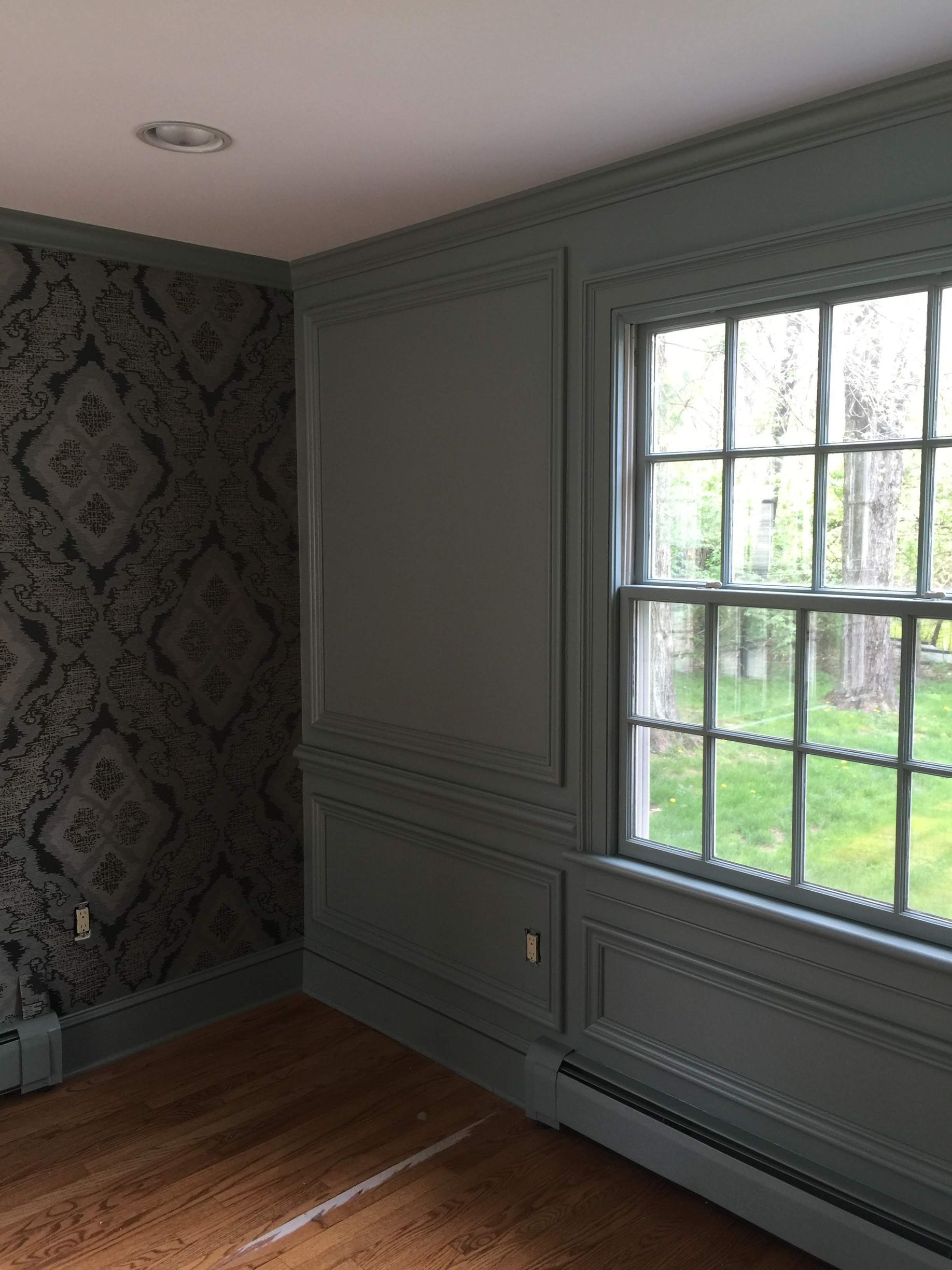 There is a large window in the middle of the room.