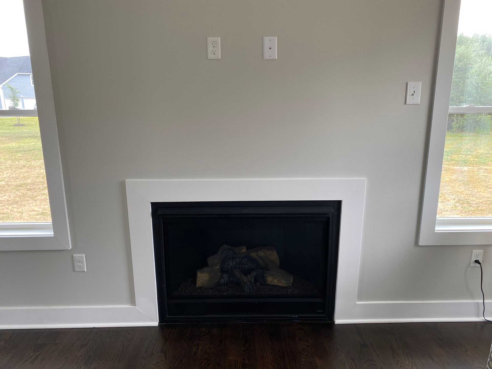 There is a fireplace in the middle of the room.