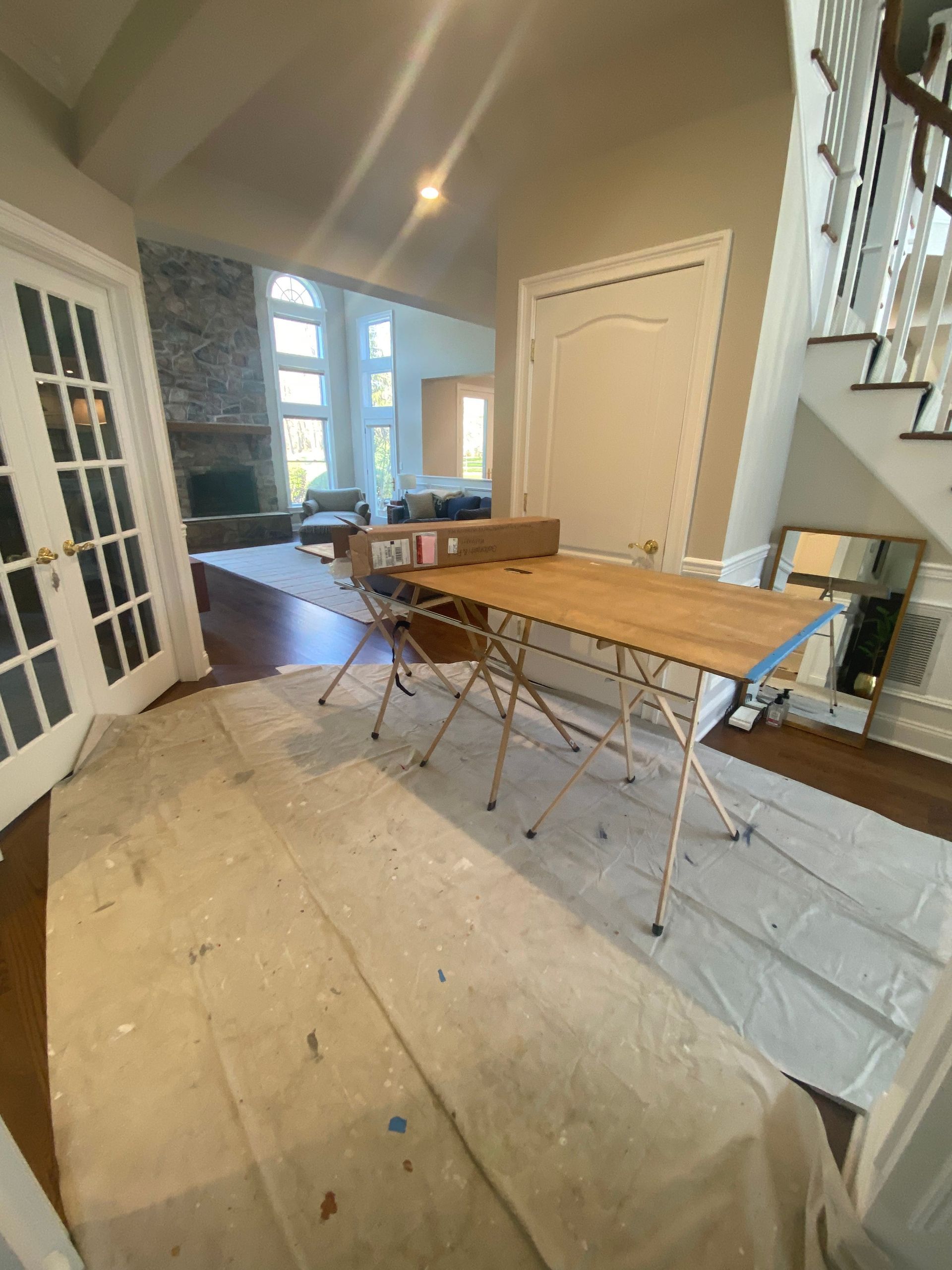 A room with a table and chairs in it