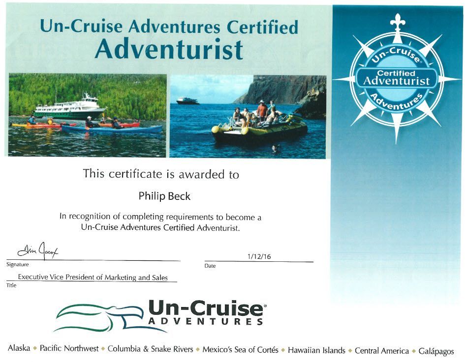 Certificate from Un-Cruise Adventures awarded to Philip Beck for becoming a certified adventurist; blue and green color scheme.