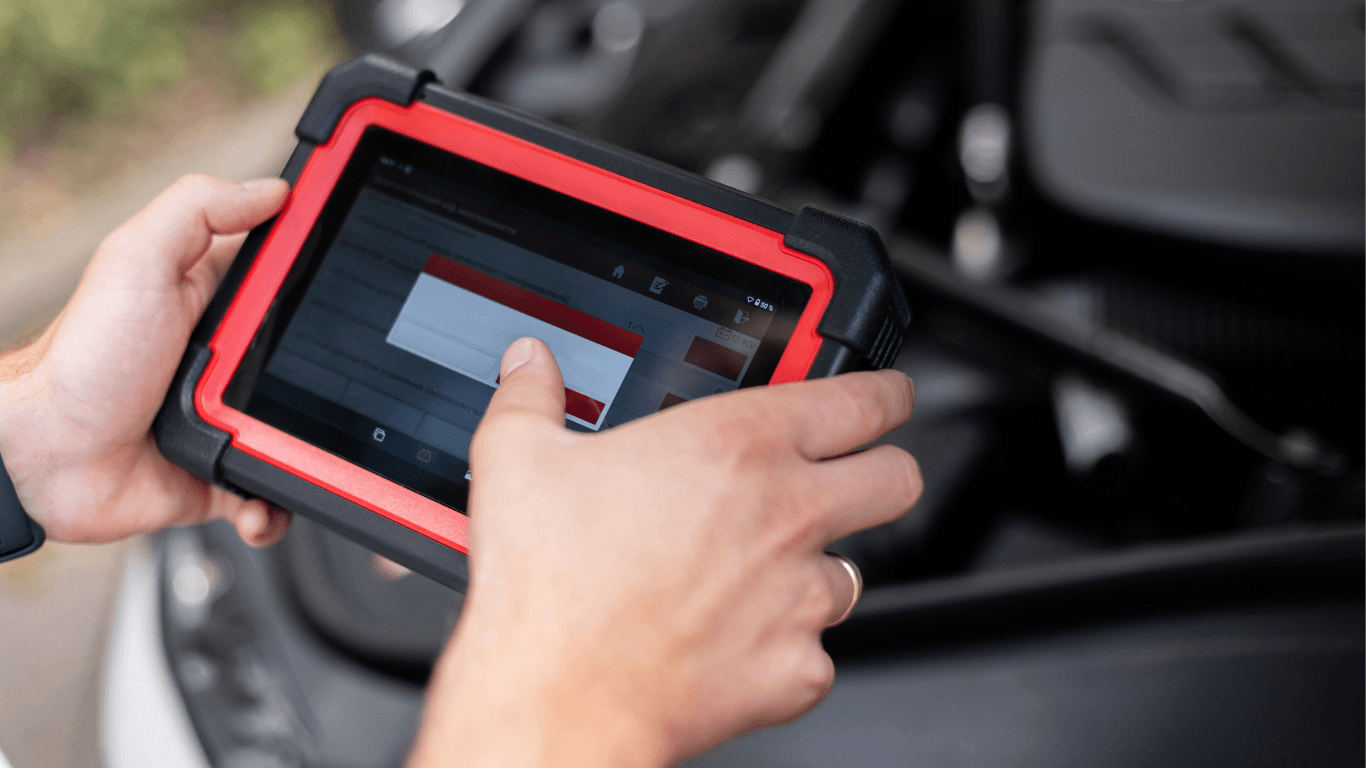 a mechanic doing a vehicle diagnostic