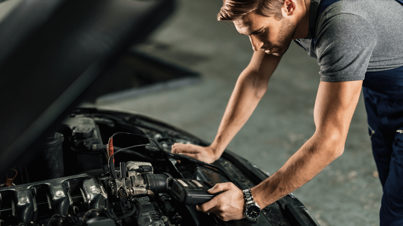 a mechanic doing a diagnostic test
