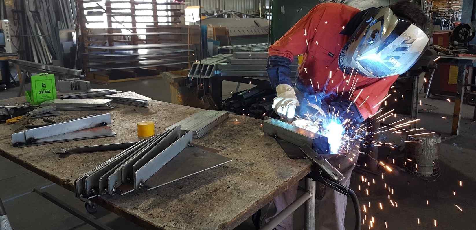 Welder Working with Metal - Metal Fabricators in Lismore, NSW