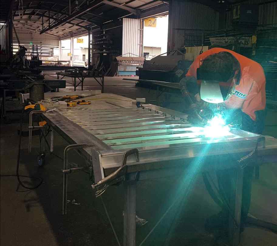 Welding The Scrap Metal Work - We Supply Grates & Gutters in Lismore, NSW