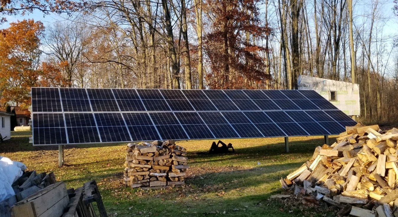 Solar Panels And Windmills On Grass Field — Davison, MI — North Coast Solar