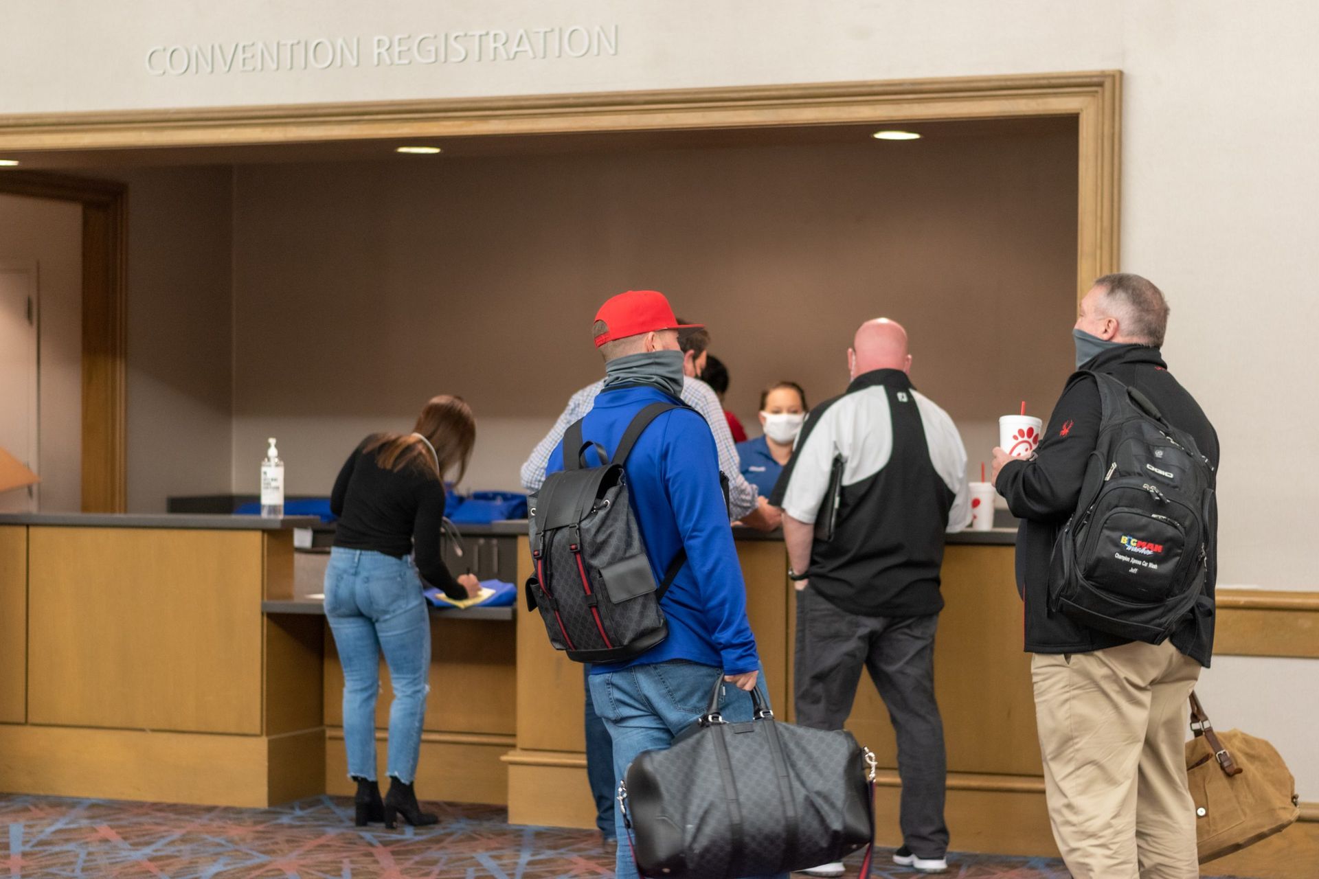 A group of people checking into the the 2020 LWF Conference.
