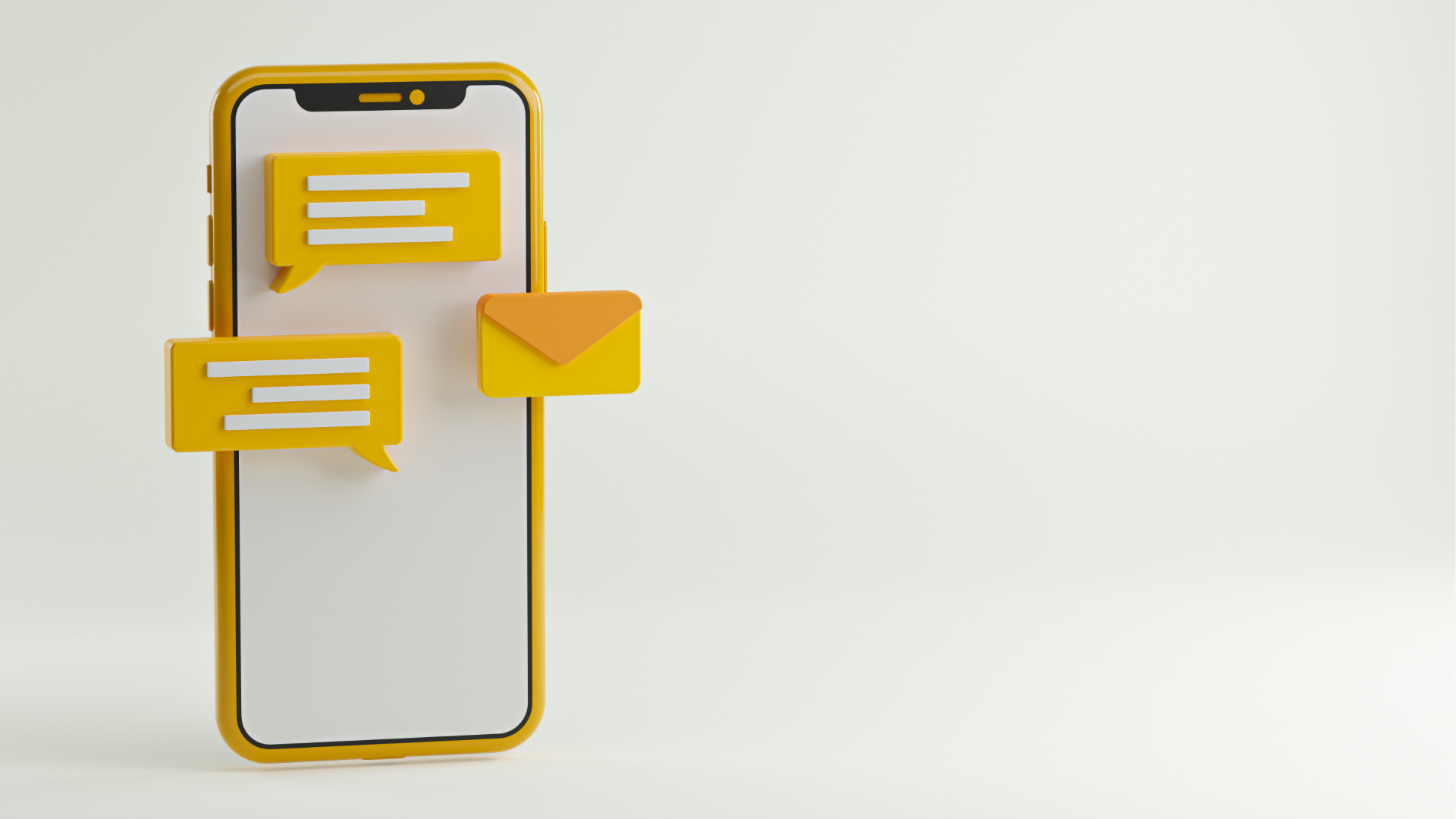 People at a table looking at laptops. They are smiling and working in a modern office.