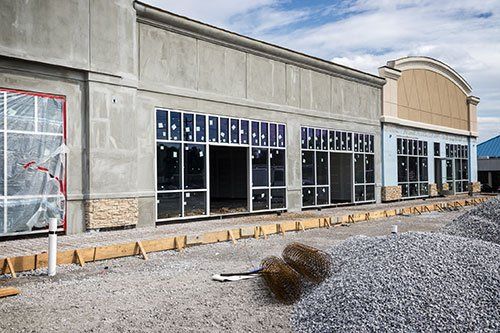 a large building with a lot of windows is being built .