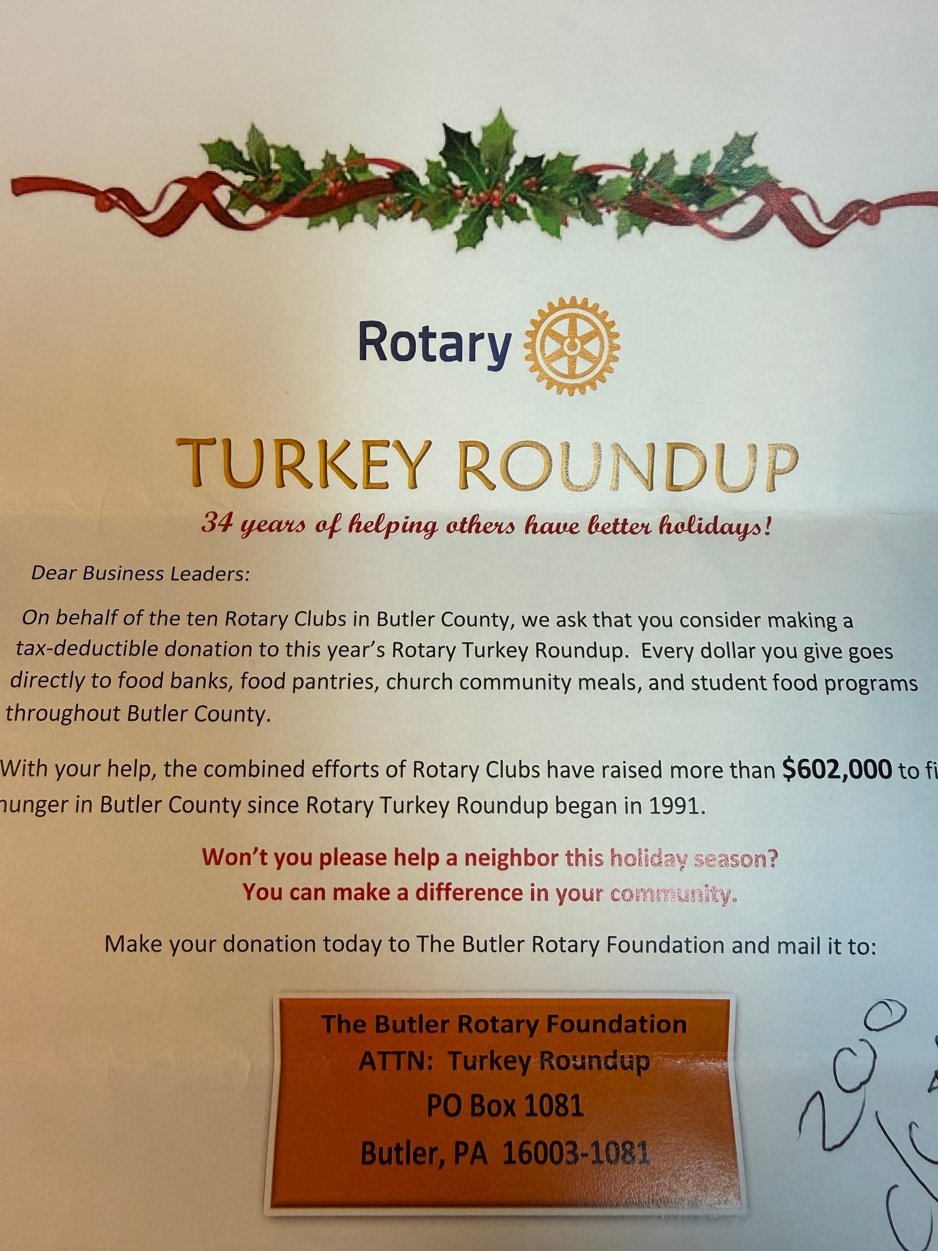 Flyer for Rotary Turkey Roundup fundraiser; orange address label; festive decorations.