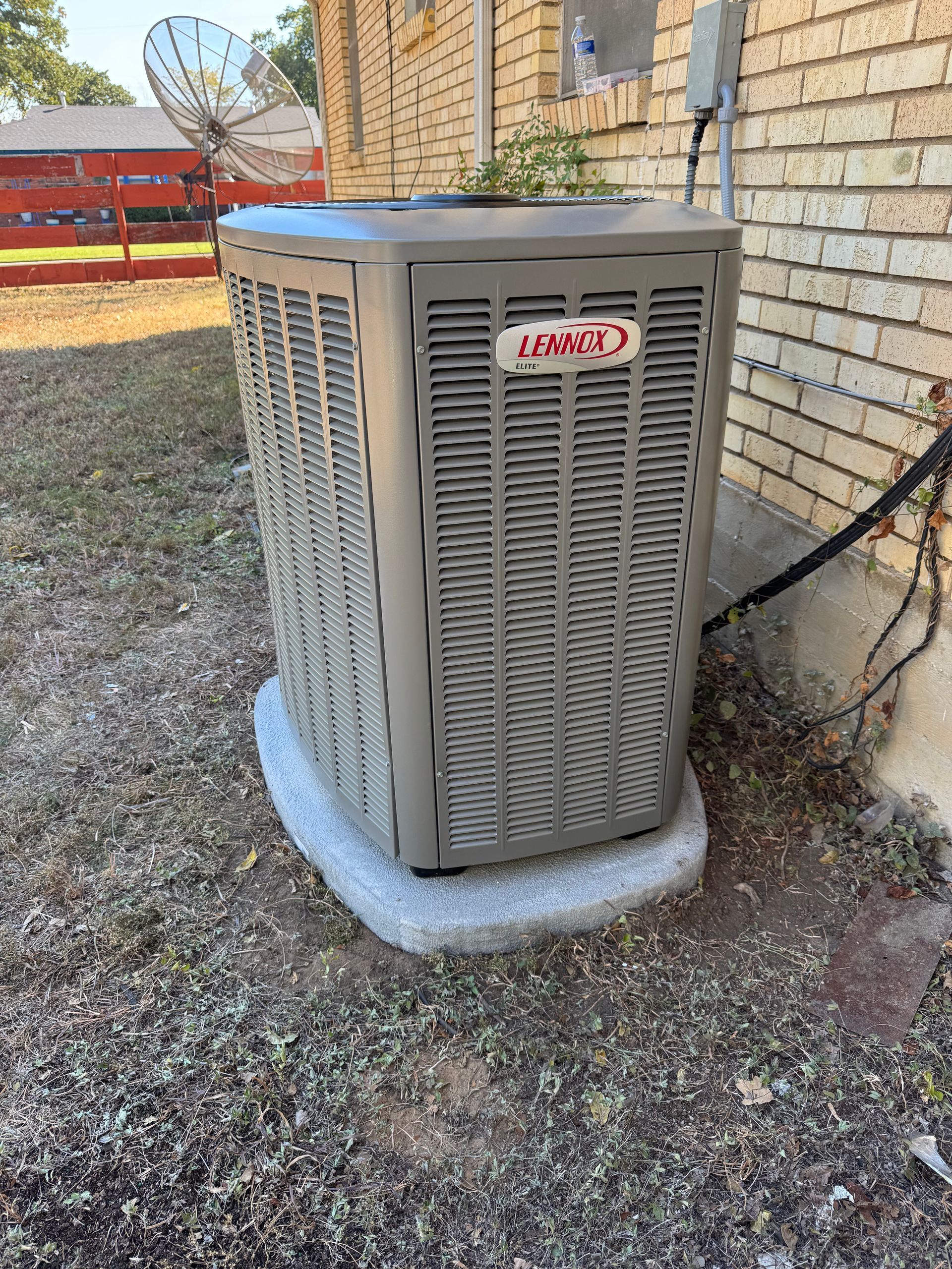 HVAC technician using a tablet to inspect equipment, with a checklist on the screen.