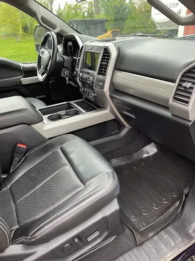 The interior of a ford f250 super duty truck is shown.