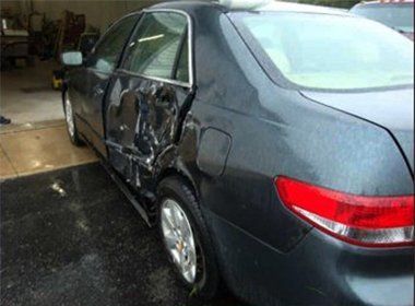 Broken Car Door — Findlay, OH — Findlay Body Repair Co. LTD