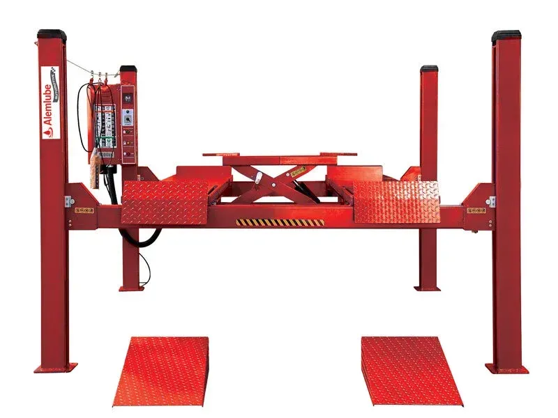 Red Four-post Car Lift With Ramps — North Queensland Independant Fuel Services in Slade Point, QLD