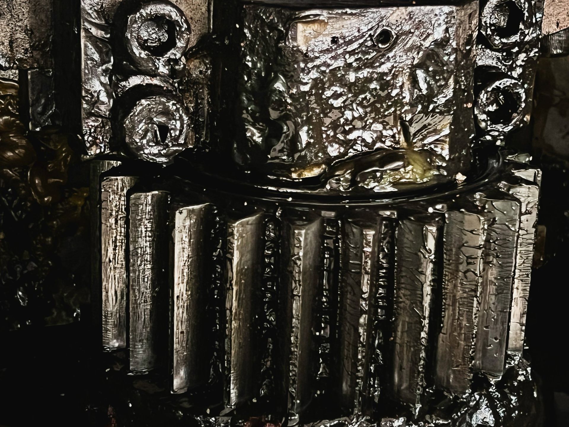 Close-up of Industrial Gears Covered in Dark Oil — North Queensland Independant Fuel Services in Rockhampton, QLD