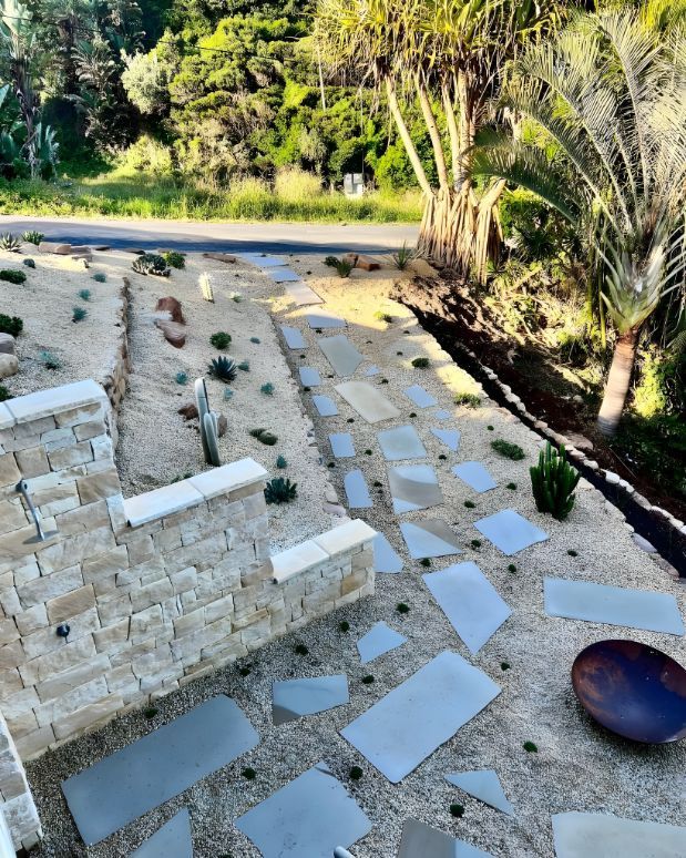 A Stone Walkway With A Bowl In The Middle Of It — Creative Landscapes Coffs Harbour In Boambee, NSW