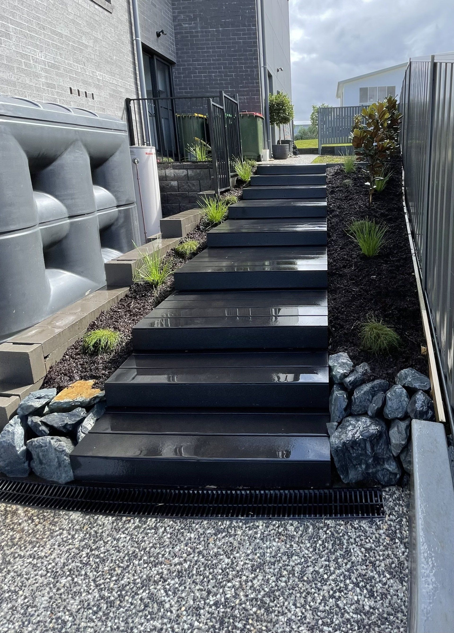 A Set Of Stairs Leading Up To A Building — Creative Landscapes Coffs Harbour In Korora, NSW