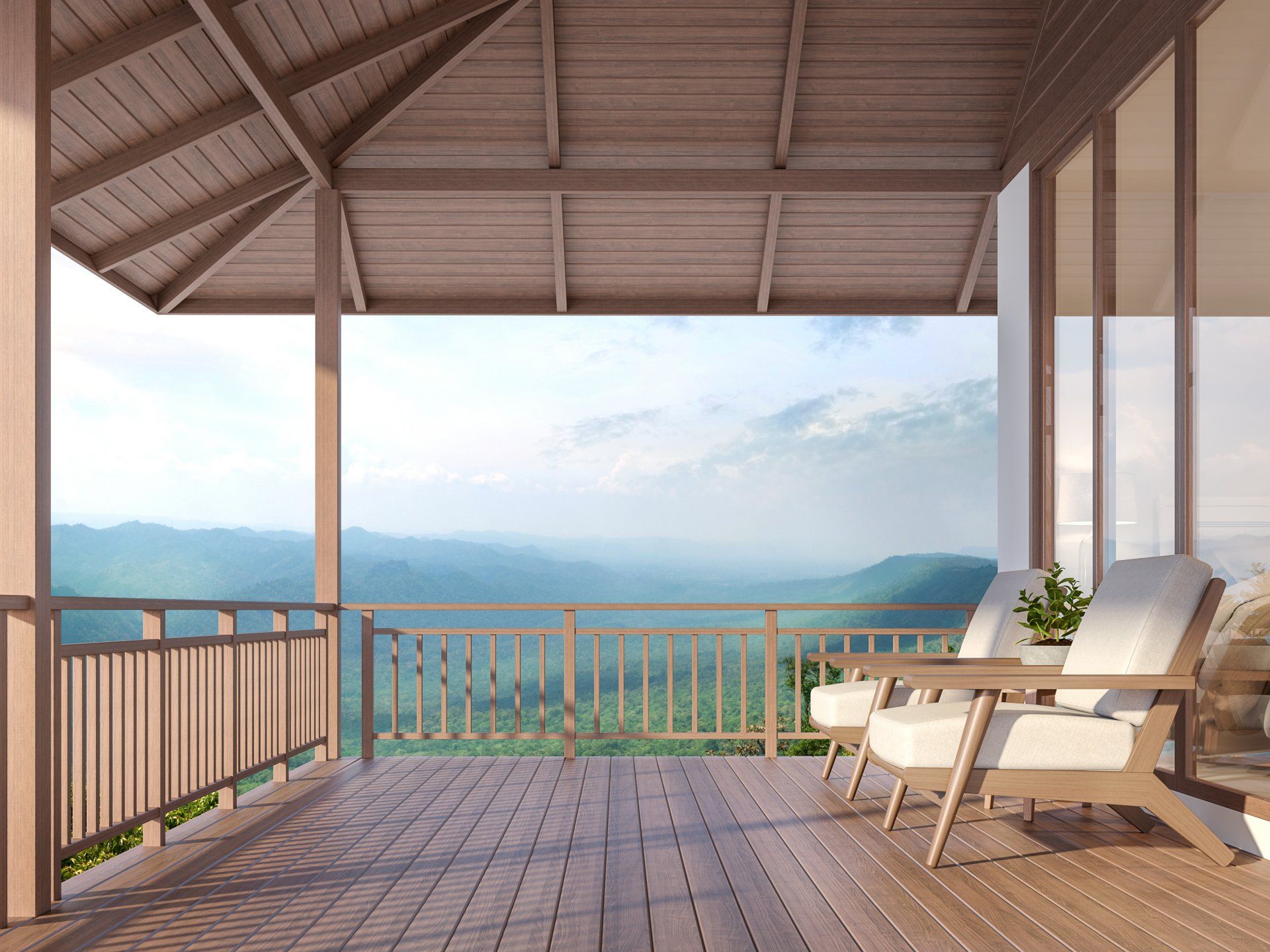 There is a balcony with a view of the mountains.