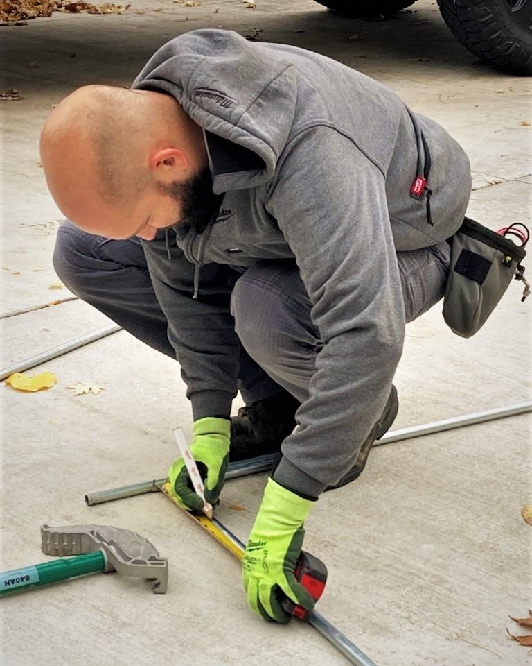 photo of electrician measuring