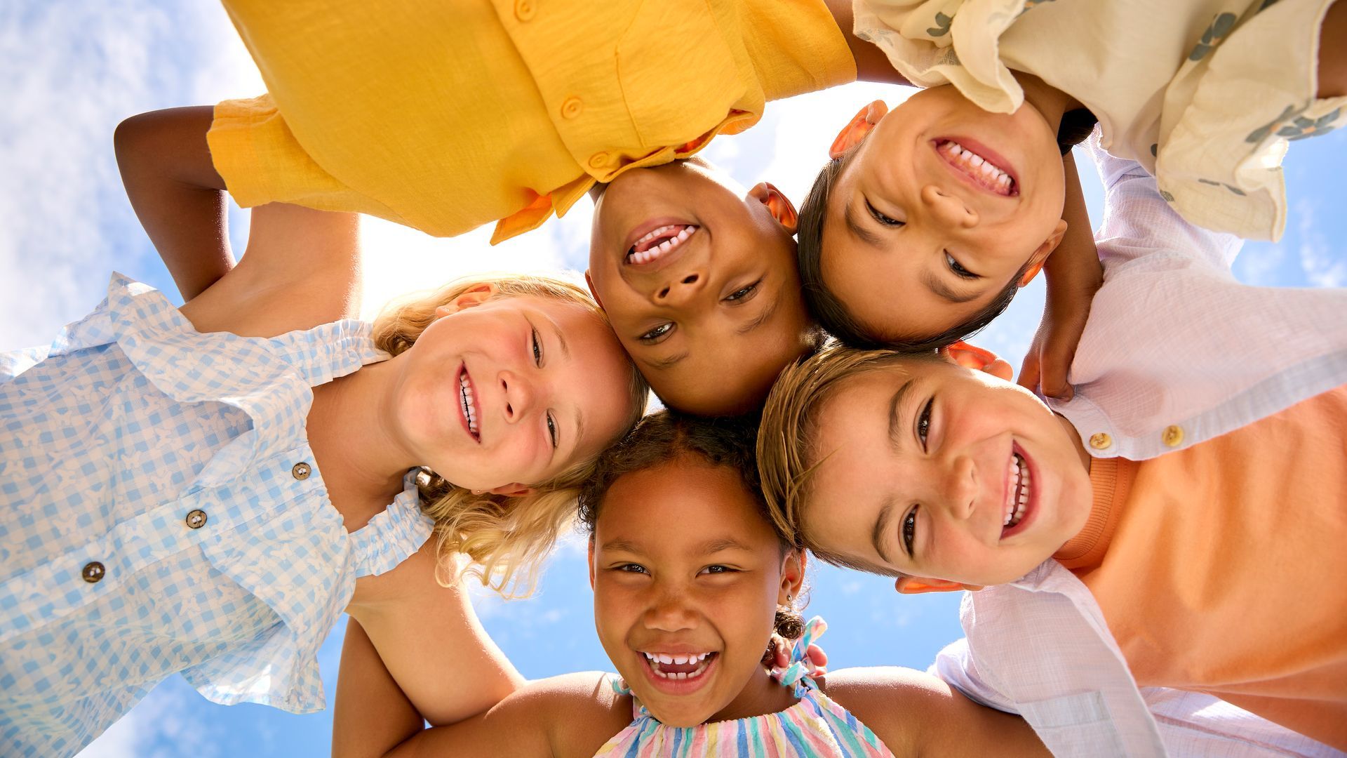 Smiling children in a circle, outside. Smiling children in a circle, outside.