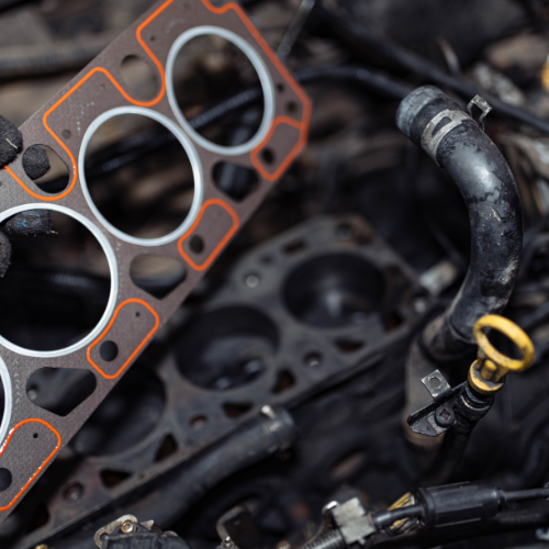A close up of a cylinder head gasket in a car engine