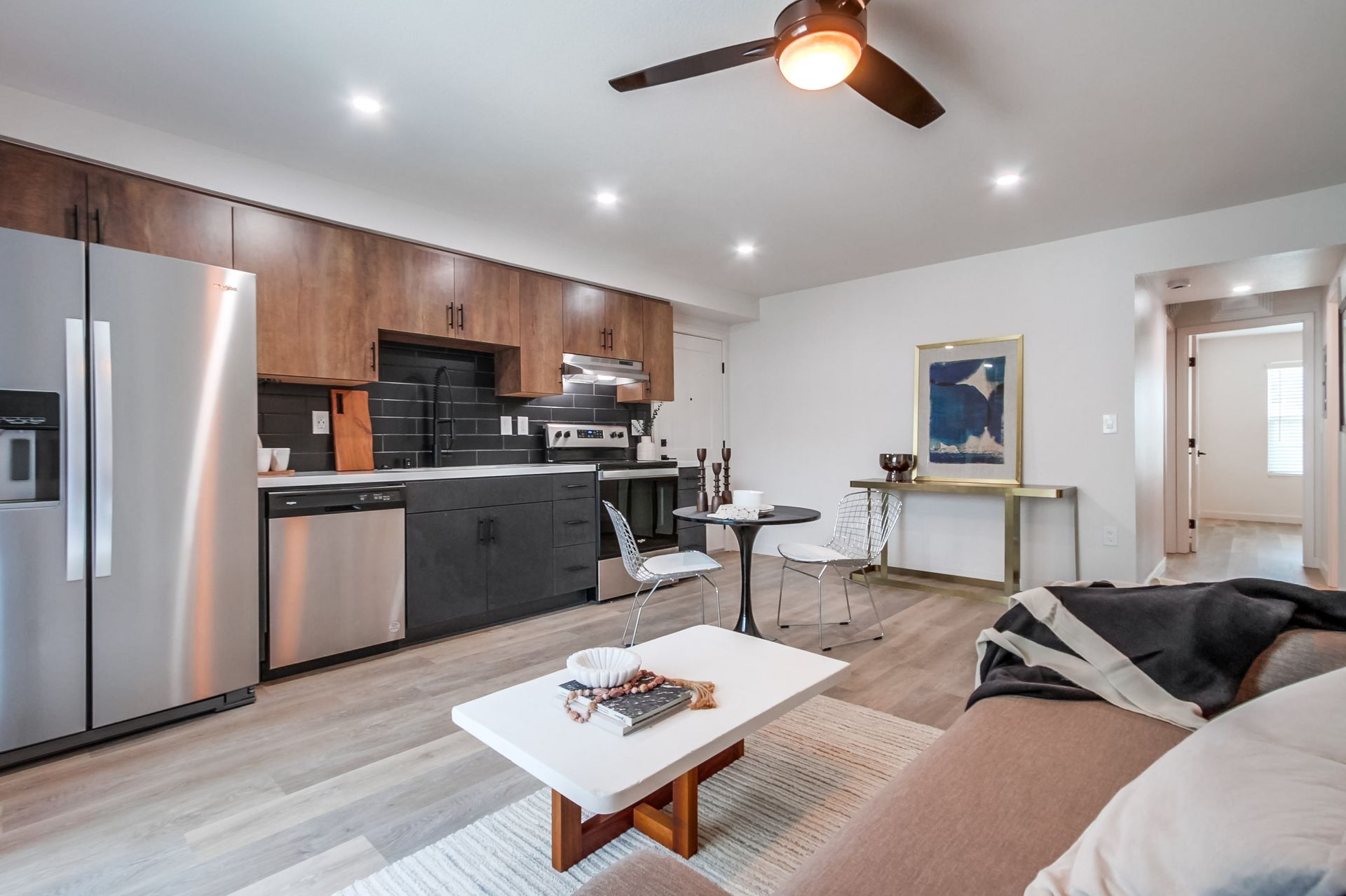 Photo showing a living room/kitchen combination