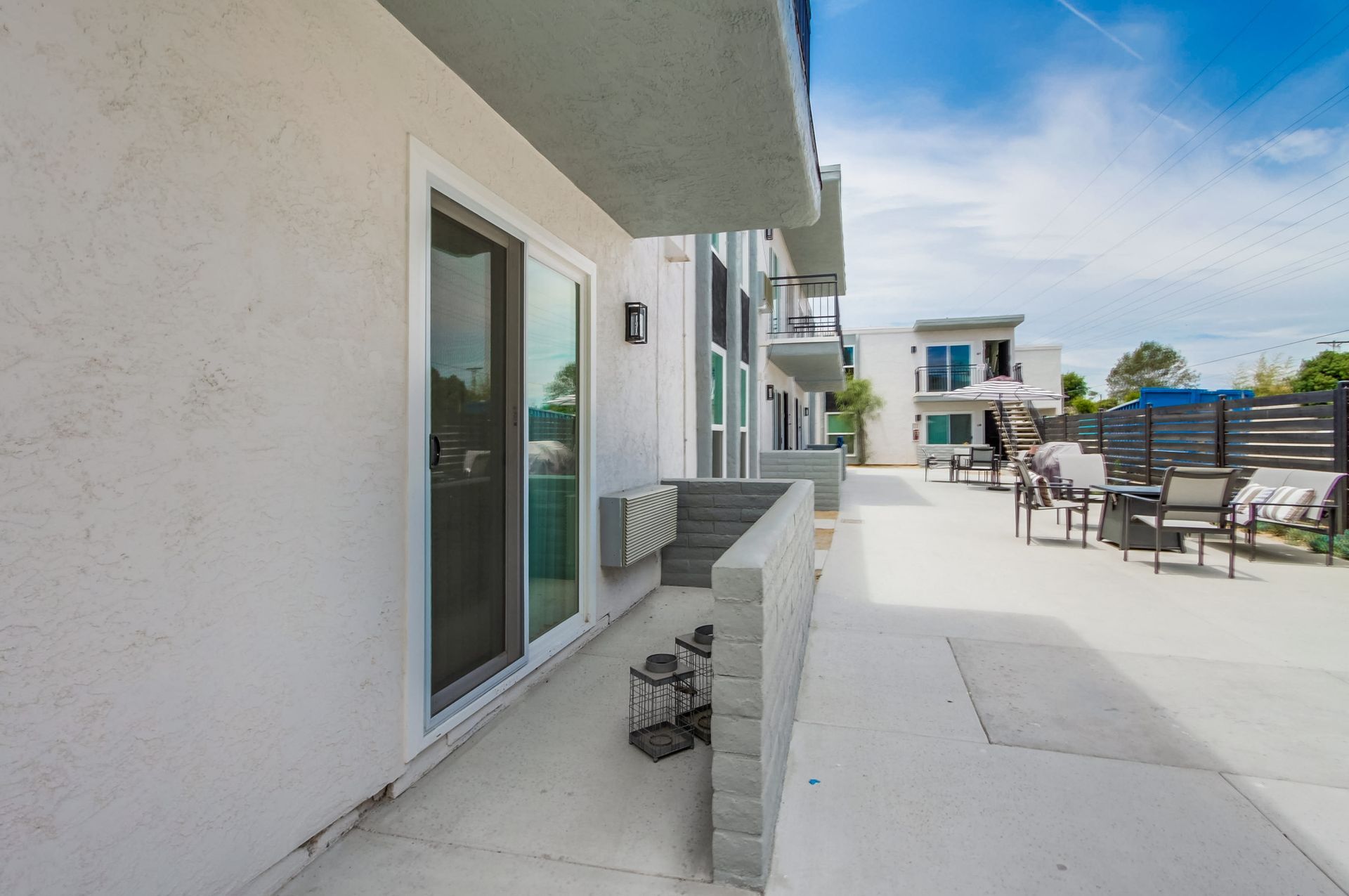 Photo showing a small brick wall with an open entrance 