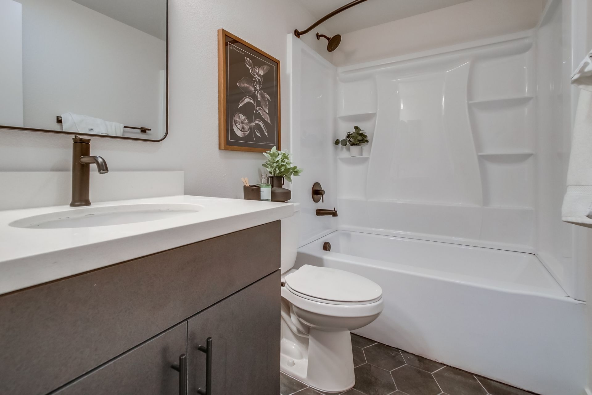 Photo showing a bathroom with a shower/tub combo