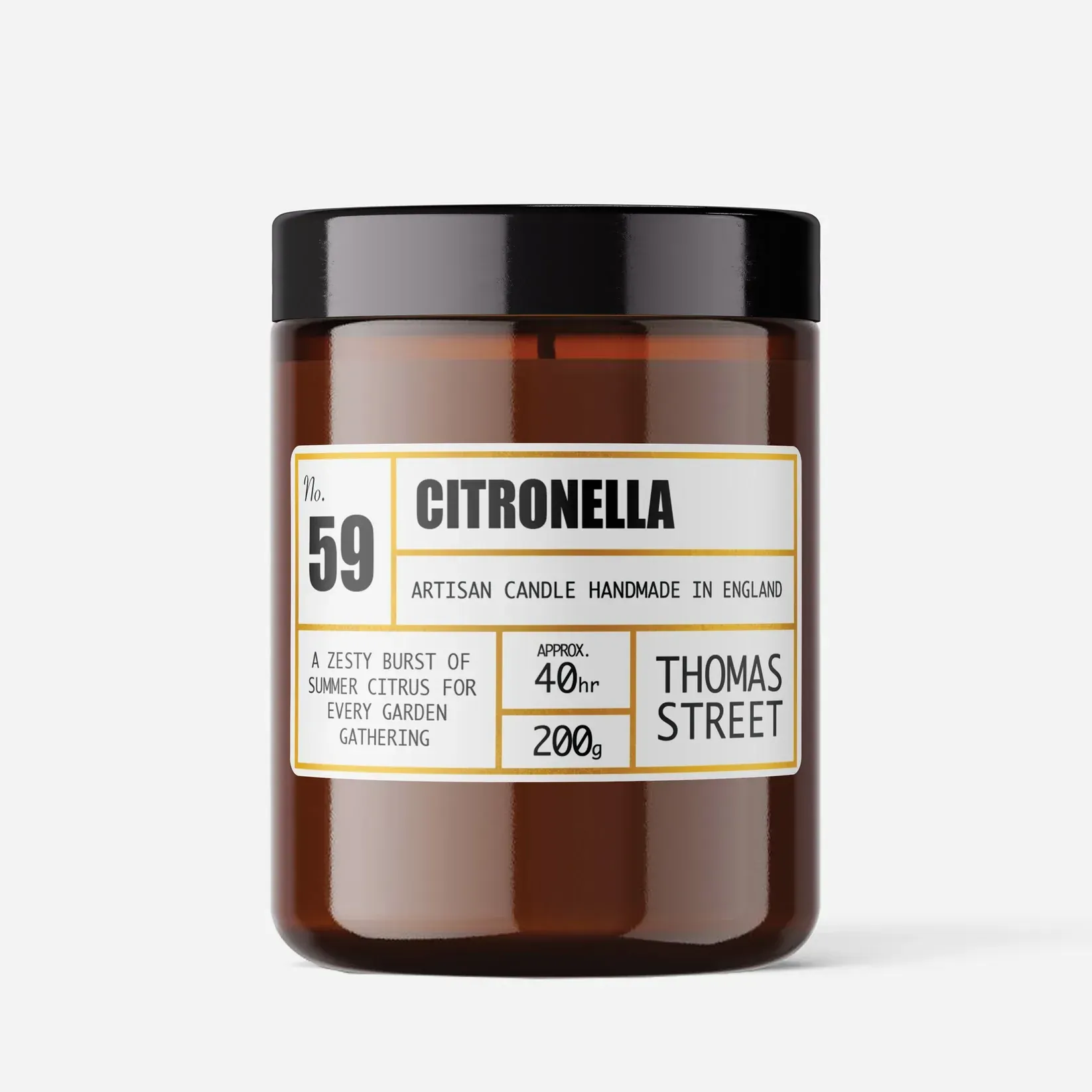 A candle in a jar with a label that says citronella