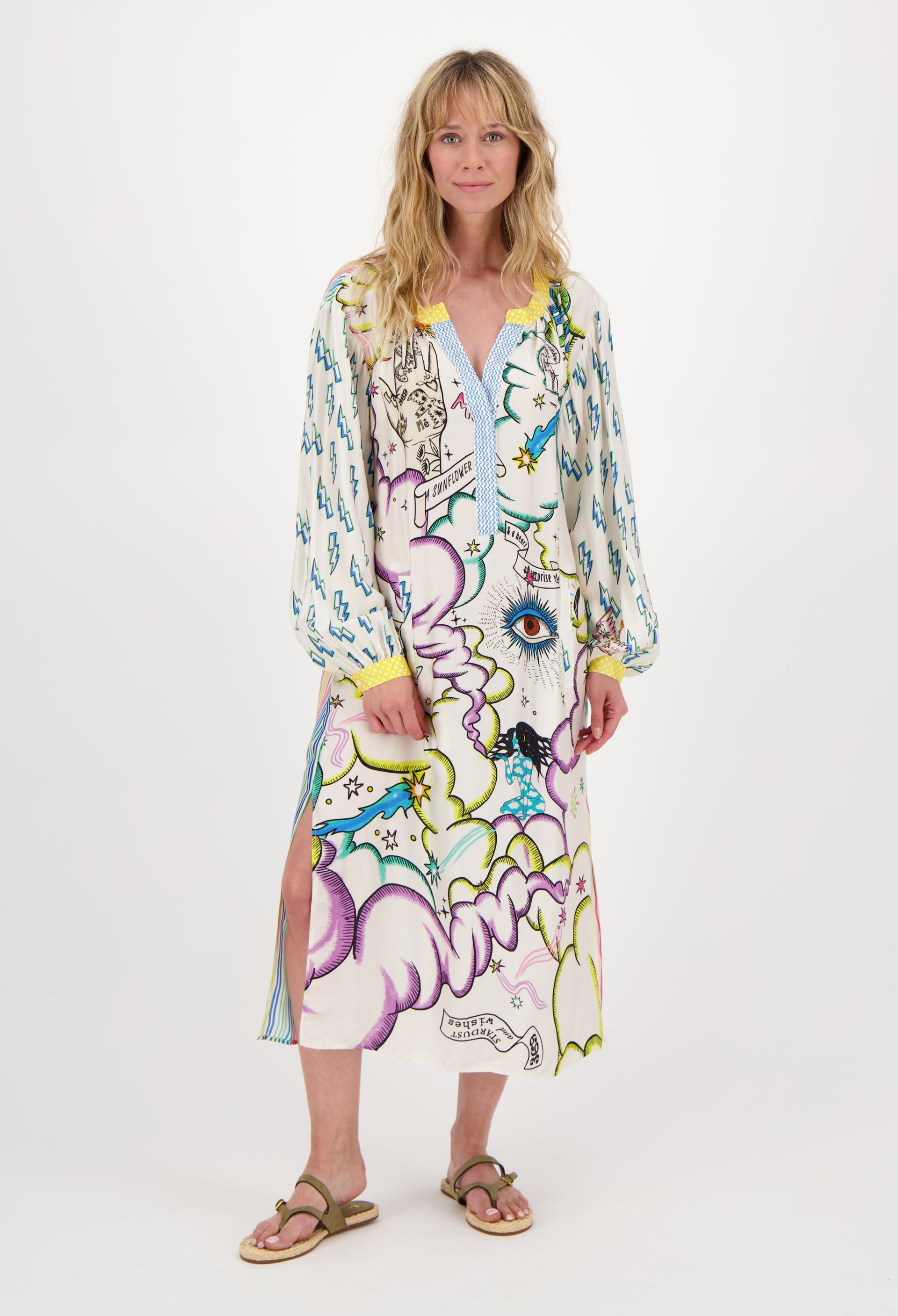 A woman is wearing a colorful dress and sandals.