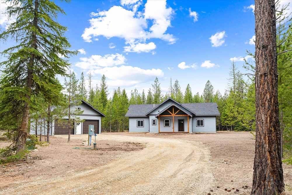 A house in the middle of a forest.