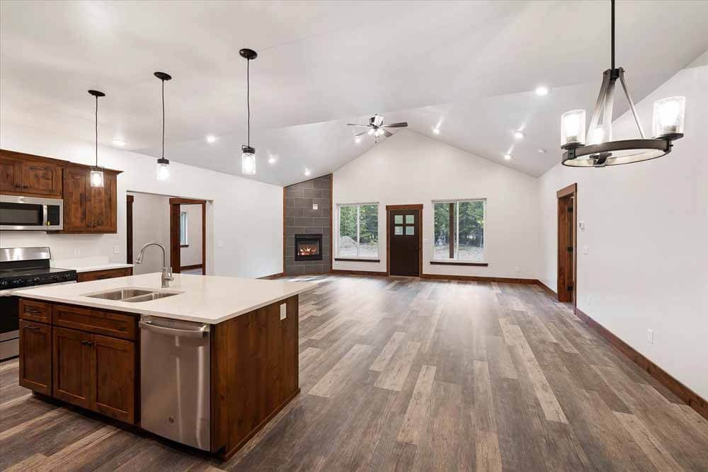 A kitchen with a large island in the middle of the room.