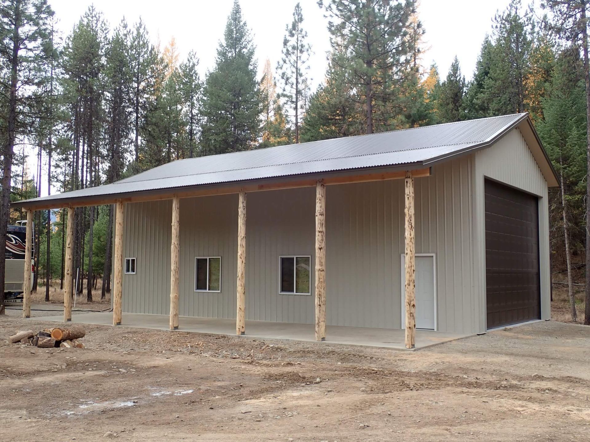 A large building with a porch and a garage door