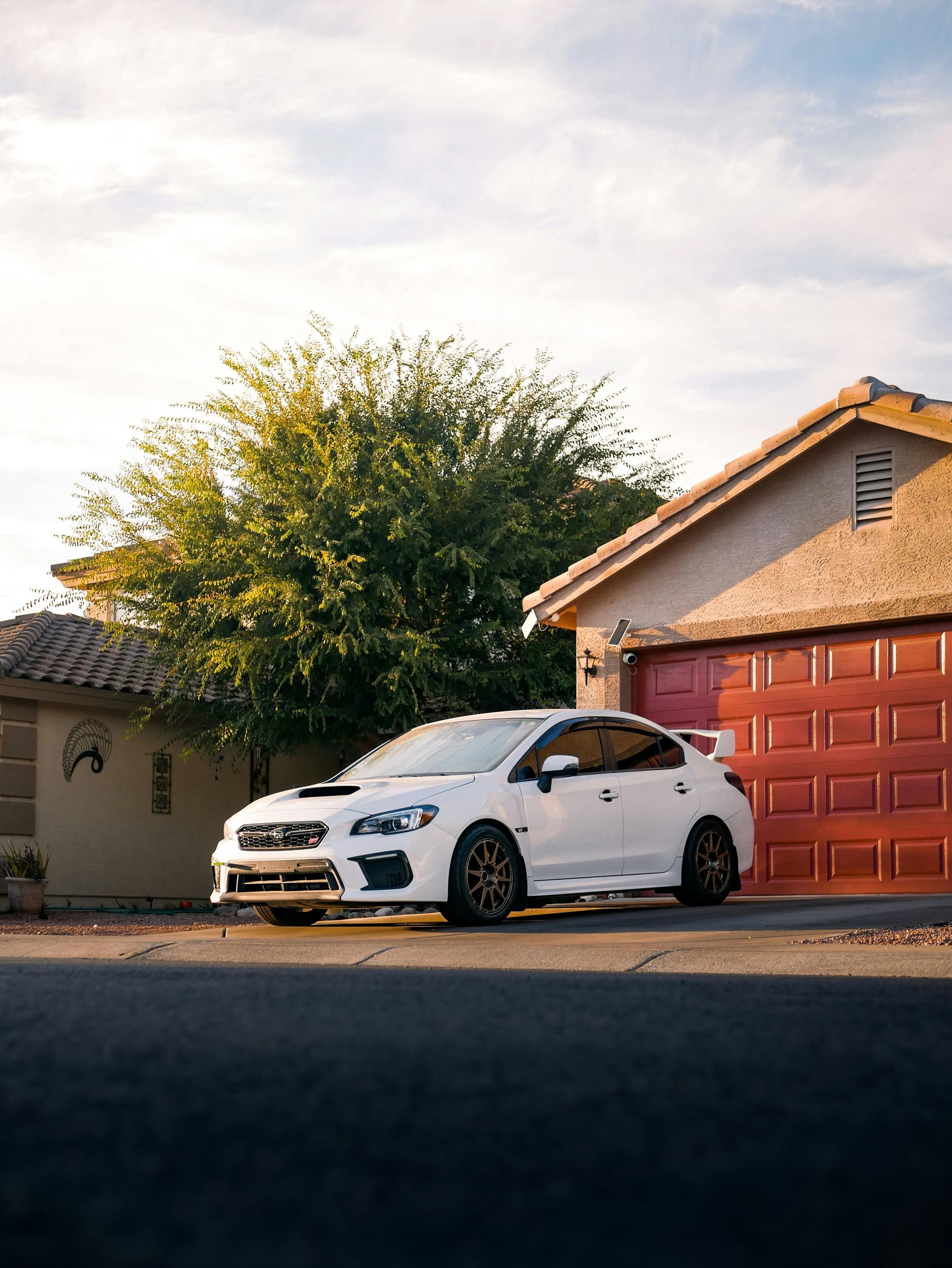 A white house with a blue sky in the background