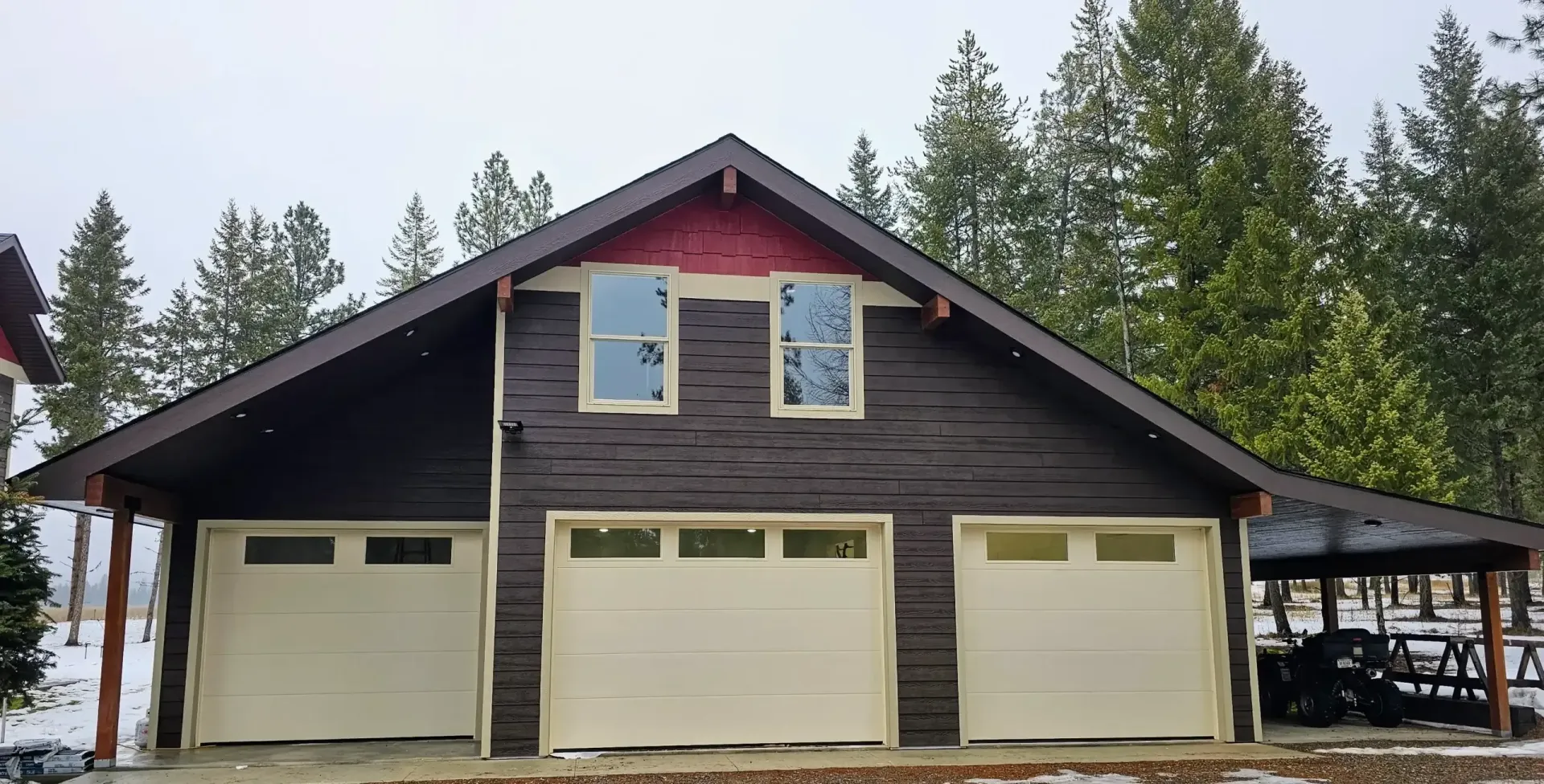 A kitchen with wooden cabinets, stainless steel appliances, and a large island.